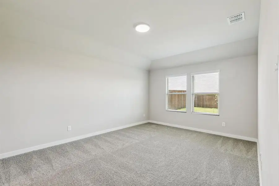 Primary Suite in the Harper home plan by Trophy Signature Homes – REPRESENTATIVE PHOTO