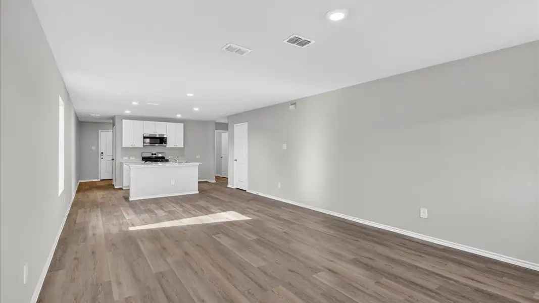 Representative unfurnished interior of a home built from the Barton by D.R. Horton in Hickory Grove, Krum (Image 8).