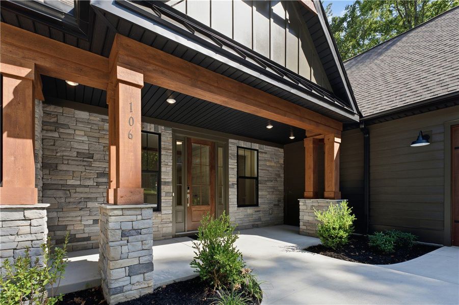 Natural stone and heavy timbers frame the welcomin