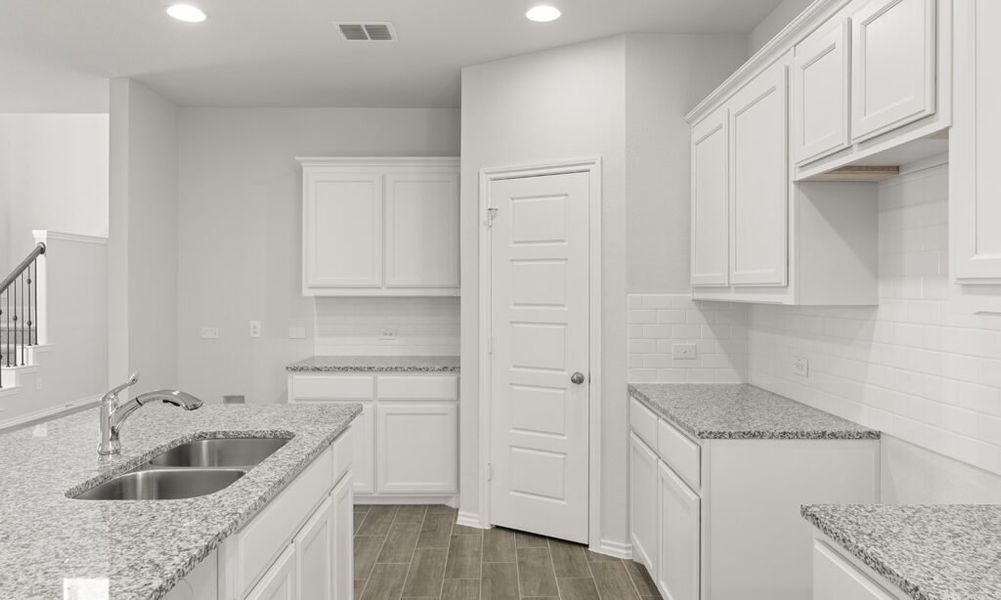 Representative exterior photo of a completed home built from the Thorndale by Impression Homes in Heartland, Heartland, TX (Image 9). Representative exterior photo of a completed home built from the Thorndale by Impression Homes in Heartland, Heartland, TX (Image 9).