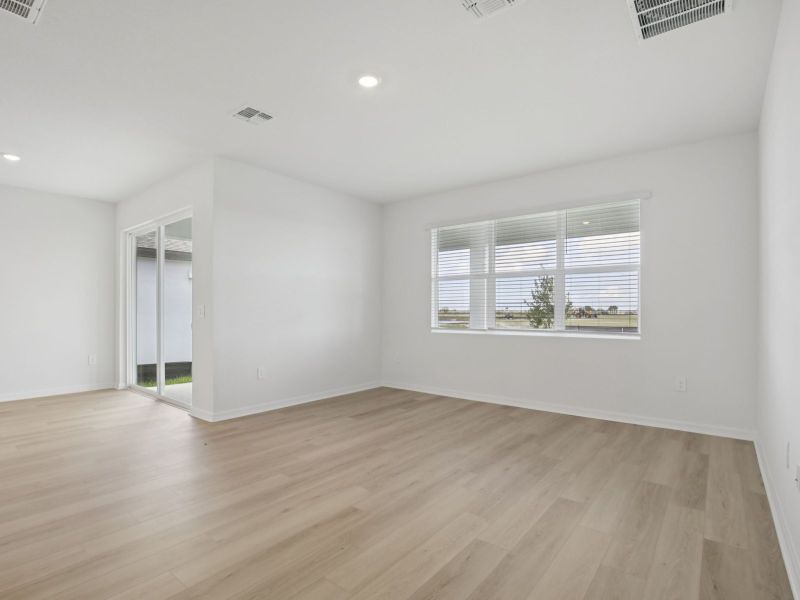 Spacious, unfurnished interior of a new home in Coasterra - Reserve Series, Palmetto (Image 10).
