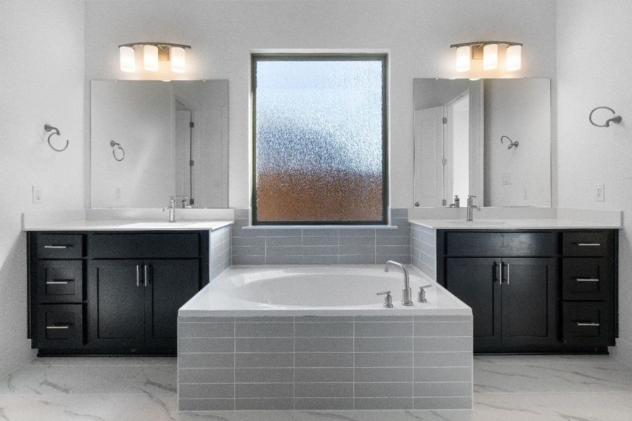 Primary Bath retreat with dual vanities & garden tub