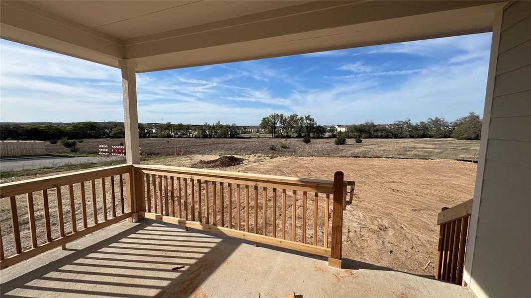 Exterior details and patio area of a home in Cannon Ranch, Dripping Springs (Image 4).