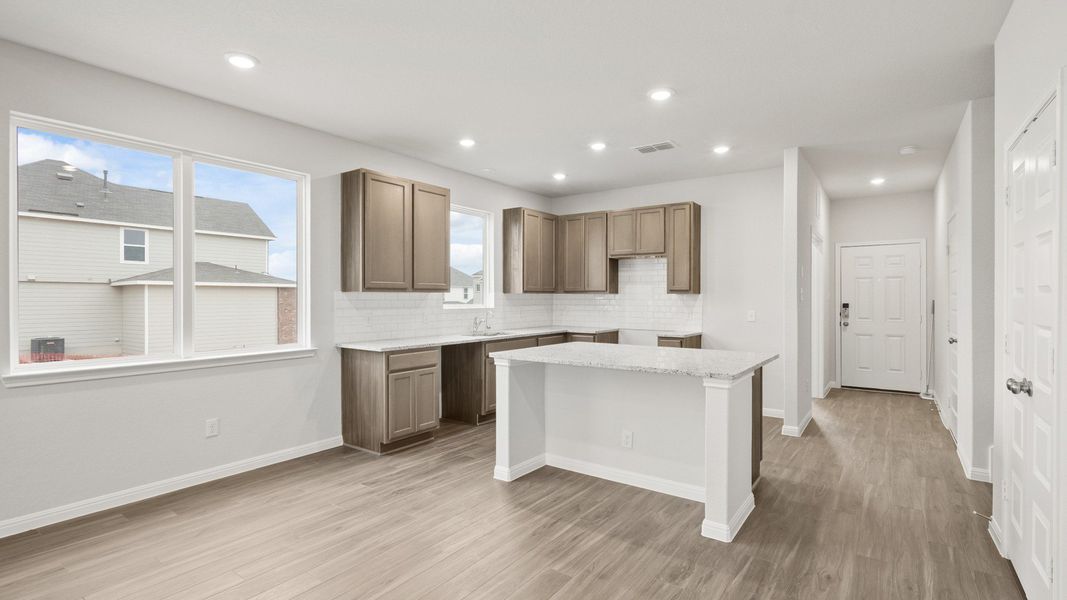 Furnished interior view inside a new home in Hunters Ranch, San Antonio (Image 7).