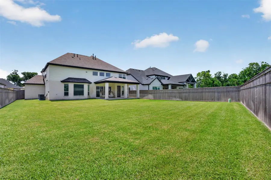Exterior details and patio area of a home in , Missouri City (Image 3).
