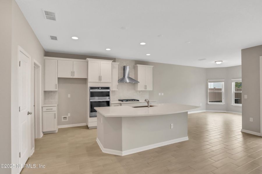Furnished interior view inside a new home in Amberly, Green Cove Springs (Image 3).