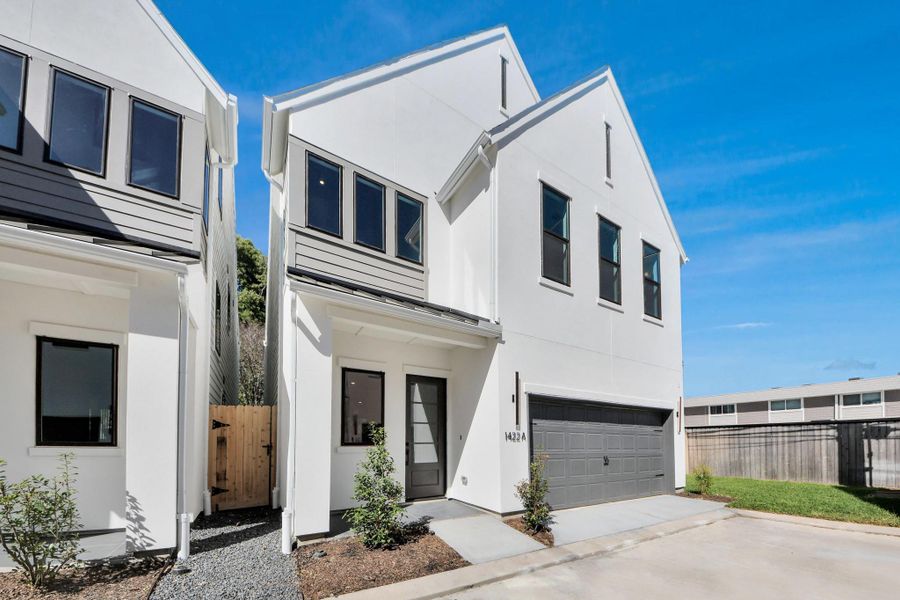 Front exterior of a new home in Caywood Place, Houston, TX, highlighting curb appeal (Image 26).