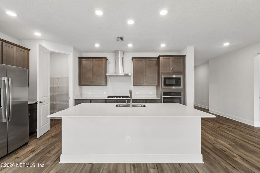 Furnished interior view inside a new home in Tributary 50', Yulee (Image 9).