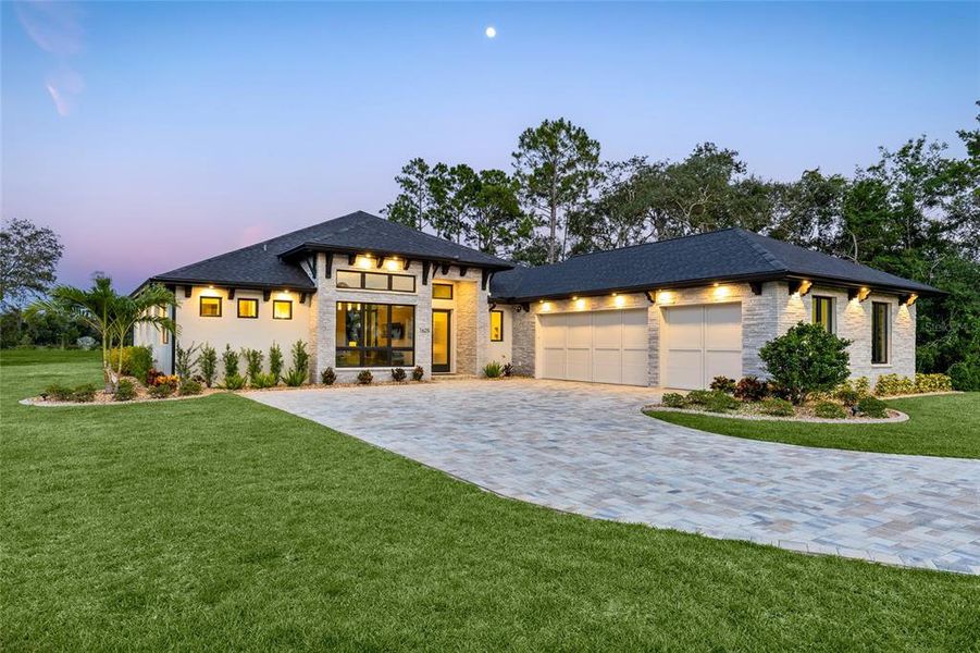 Front exterior of a new home in , New Smyrna Beach, FL, highlighting curb appeal (Image 23). Front exterior of a new home in , New Smyrna Beach, FL, highlighting curb appeal (Image 23).