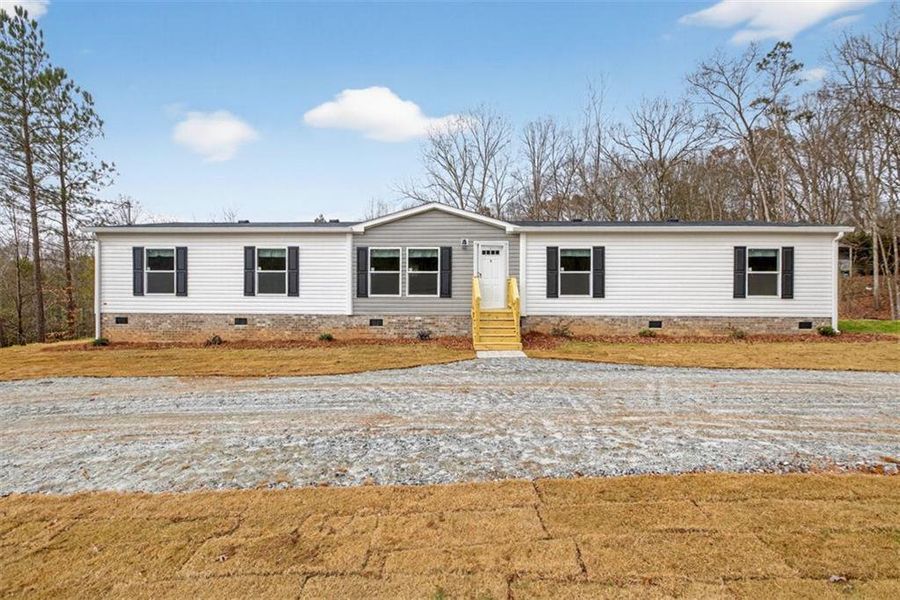 Exterior details and patio area of a home in , Royston (Image 22).