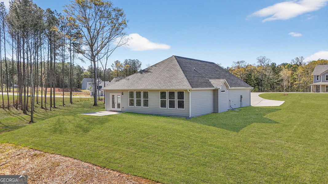 Exterior details and patio area of a home in Stone Brooke, Gray (Image 3).