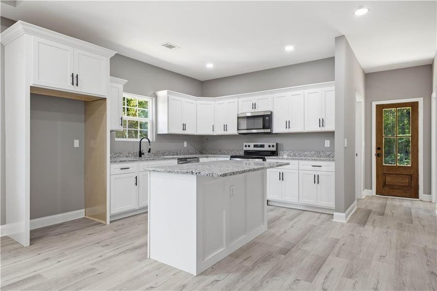Furnished interior view inside a new home in , Calhoun (Image 5).