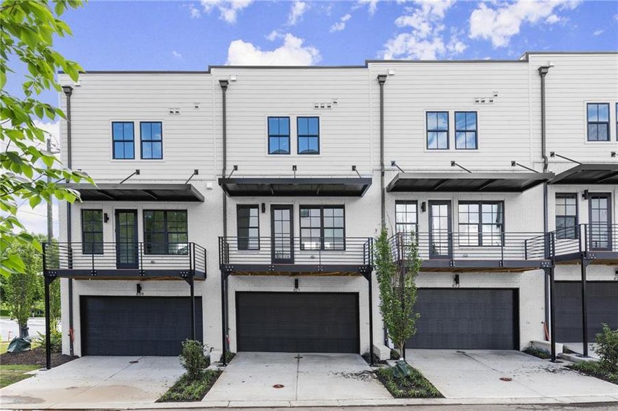Front exterior of a new home in , Alpharetta, GA, highlighting curb appeal (Image 2).