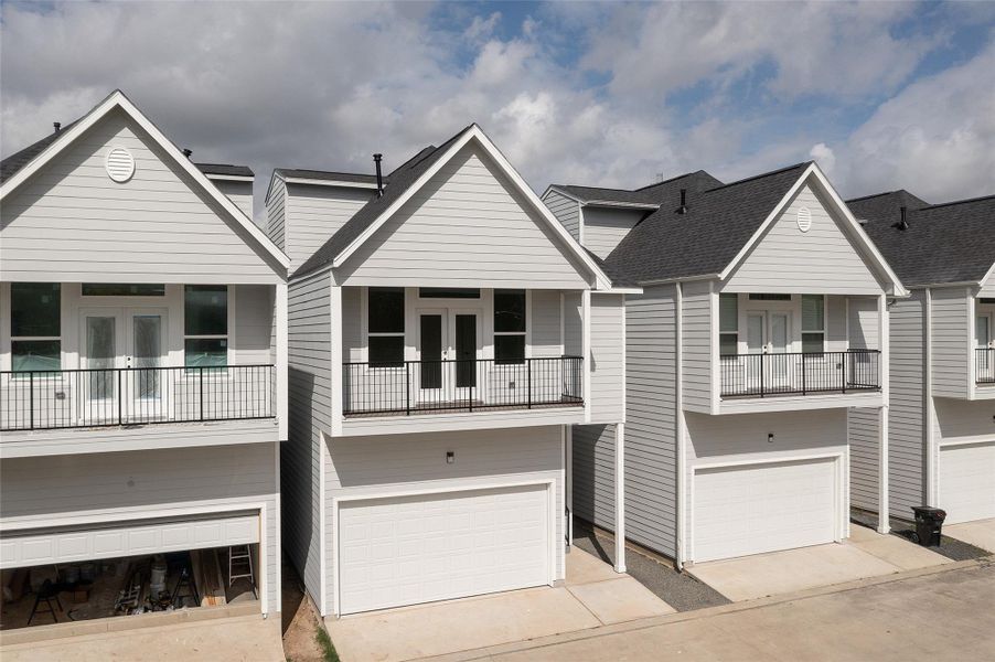 Front exterior of a new home in , Houston, TX, highlighting curb appeal (Image 27).