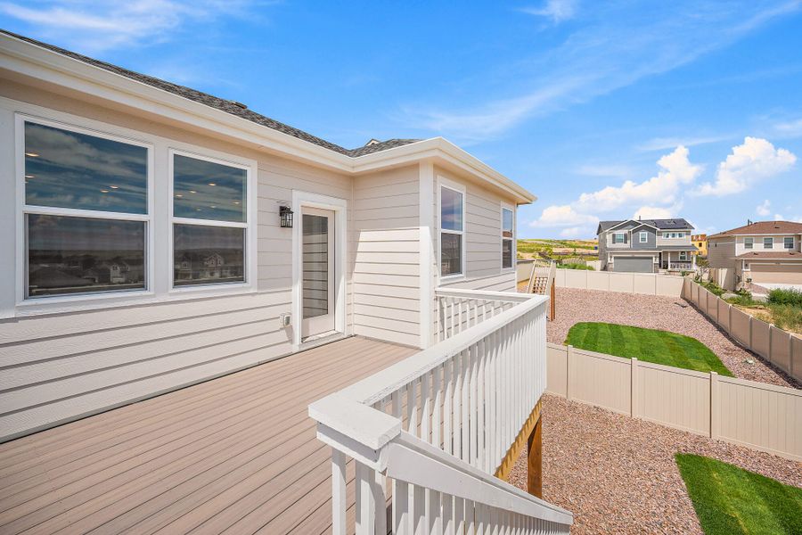Front exterior of a new home in Trails at Aspen Ridge-3, Colorado Springs, CO, highlighting curb appeal (Image 19). Front exterior of a new home in Trails at Aspen Ridge-3, Colorado Springs, CO, highlighting curb appeal (Image 19).