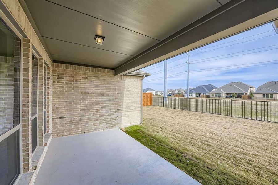 Exterior details and patio area of a home in Wellington, Fort Worth (Image 3).
