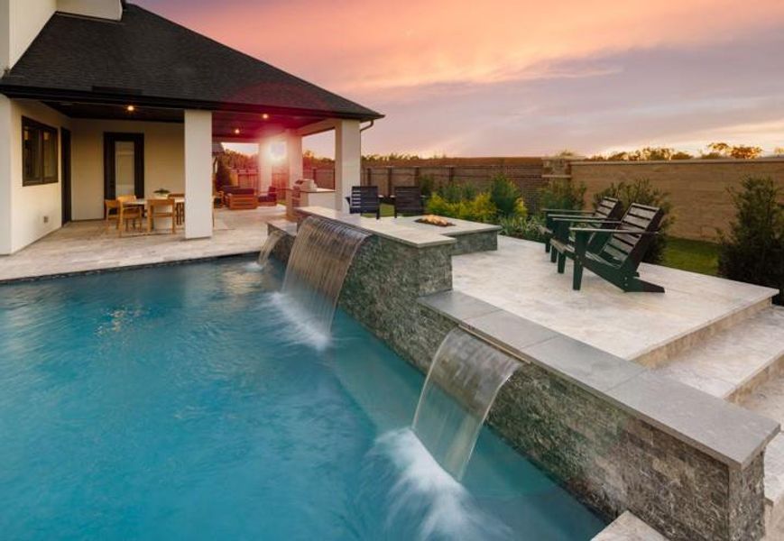 Exterior details and patio area of a home in Sienna, Missouri City (Image 27).