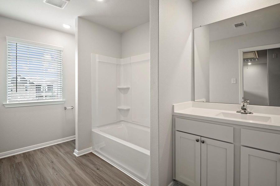 Furnished interior view inside a new home in Sweetwater Ridge, Conroe (Image 8).