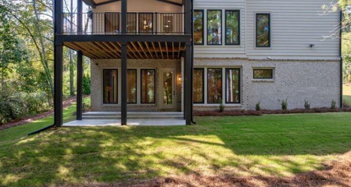 Front exterior of a new home in , Cumming, GA, highlighting curb appeal (Image 23). Front exterior of a new home in , Cumming, GA, highlighting curb appeal (Image 23).