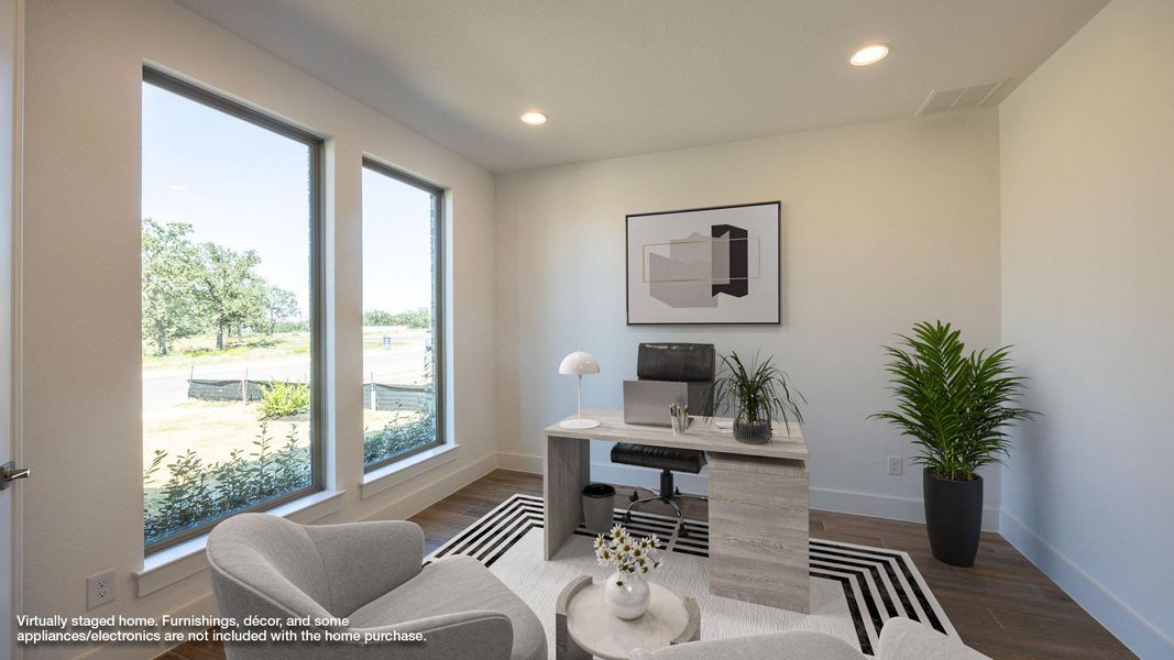 Home office featuring recessed lighting and wood finished floors Home office featuring recessed lighting and wood finished floors