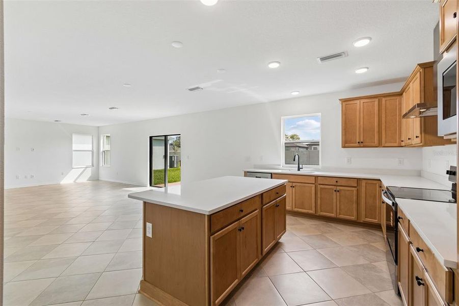 Furnished interior view inside a new home in Avalon West, Spring Hill (Image 16).