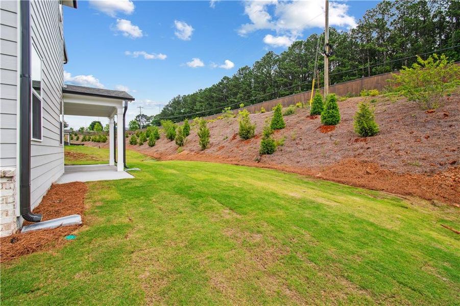 Exterior details and patio area of a home in Hillside Manor, Powder Springs (Image 3).