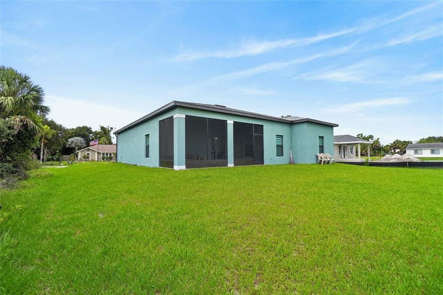 Exterior details and patio area of a home in , Port Charlotte (Image 29).