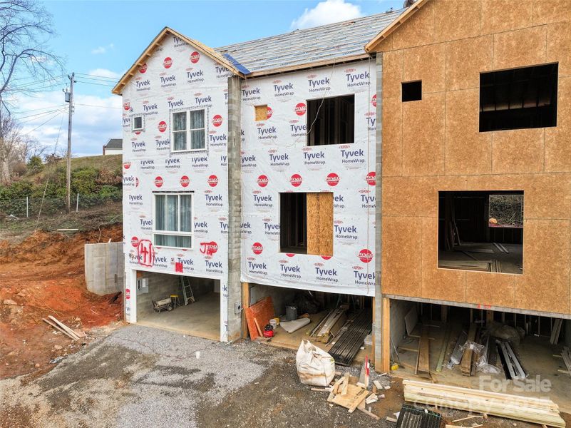 Construction; Subject is the second from the left