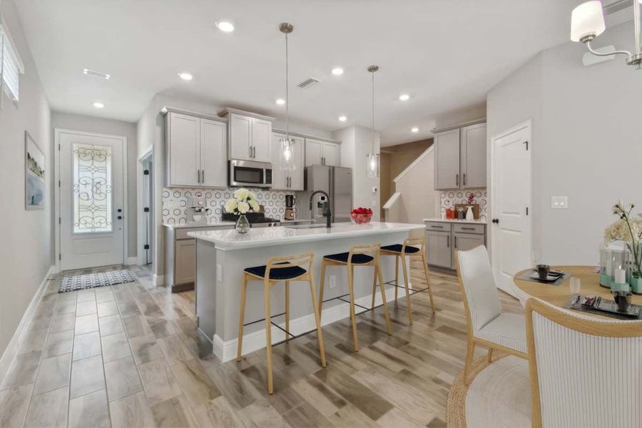 Furnished interior view inside a new home in Fairway Pointe - 55+ Villa Community, Sun City Center (Image 12).