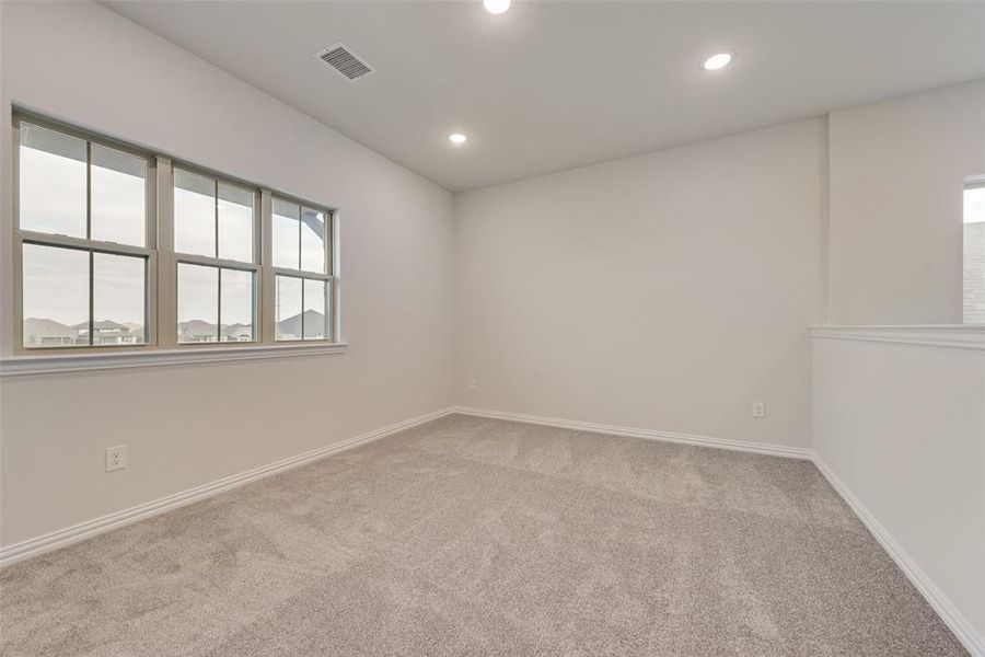 Spacious, unfurnished interior of a new home in Spiritas Ranch, Little Elm (Image 28).