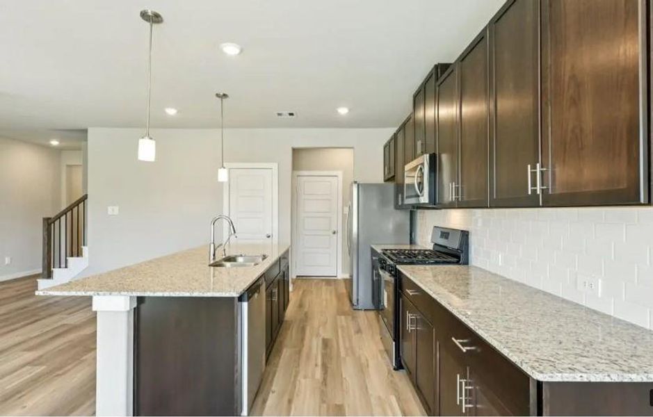 Photo is not of the actual home, but is an inspirational photo of builder’s model home and may depict options, furnishings, and/or decorator features that are not included Photo is not of the actual home, but is an inspirational photo of builder’s model home and may depict options, furnishings, and/or decorator features that are not included