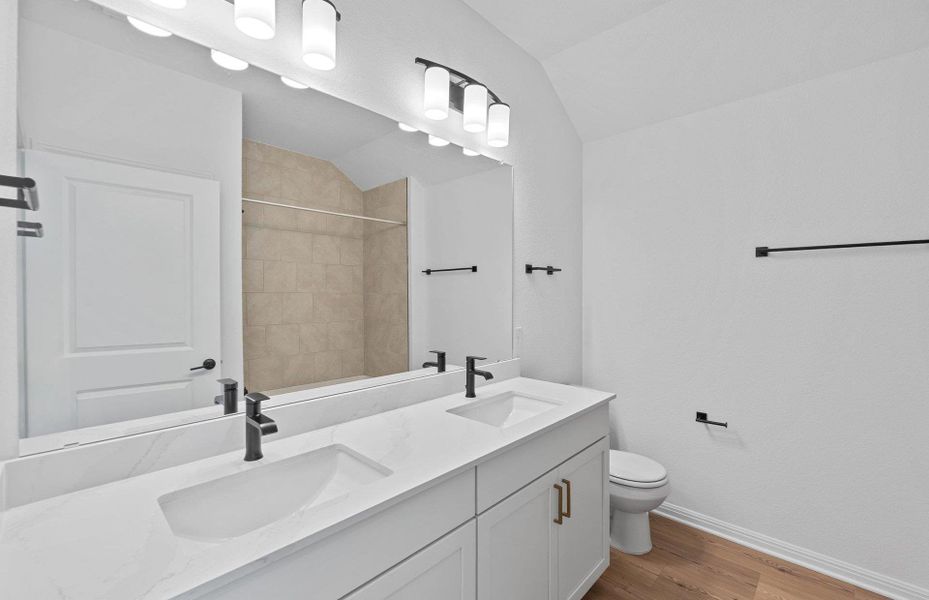 Furnished interior view inside a new home in West Cypress Hills, Spicewood (Image 7).