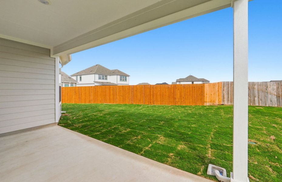 Exterior details and patio area of a home in Santa Rita Ranch, Liberty Hill (Image 28).