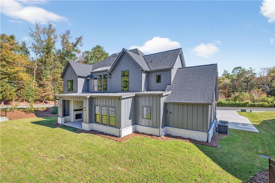 Front exterior of a new home in Town Farms, Peachtree Corners, GA, highlighting curb appeal (Image 26).