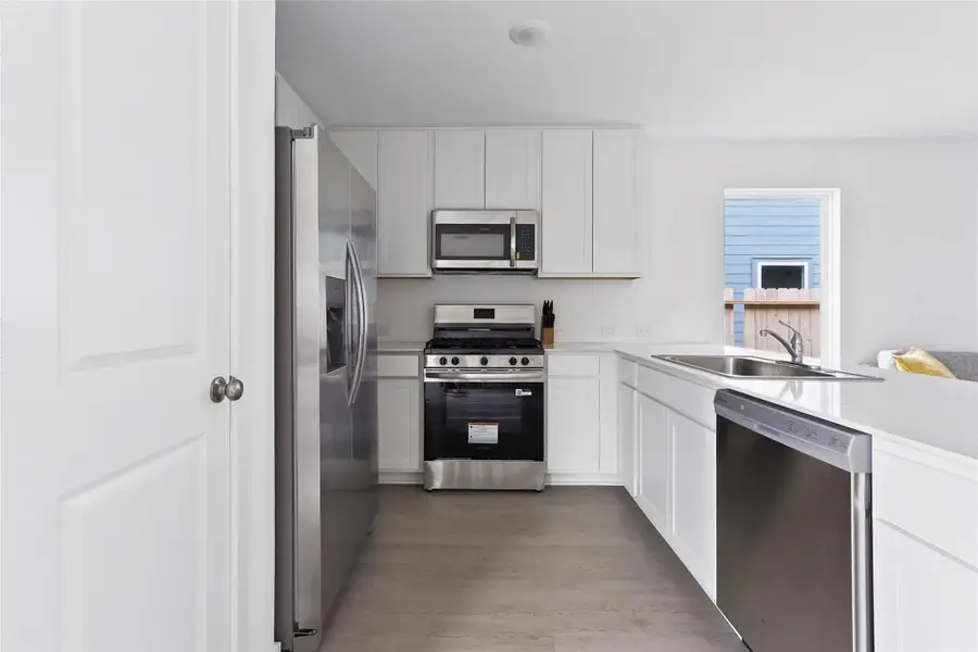 Furnished interior view inside a new home in Pinewood Trails, Cleveland (Image 5).