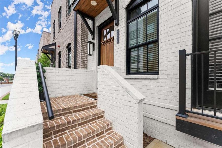 Exterior details and patio area of a home in Skyview On Broad, Sugar Hill (Image 28).