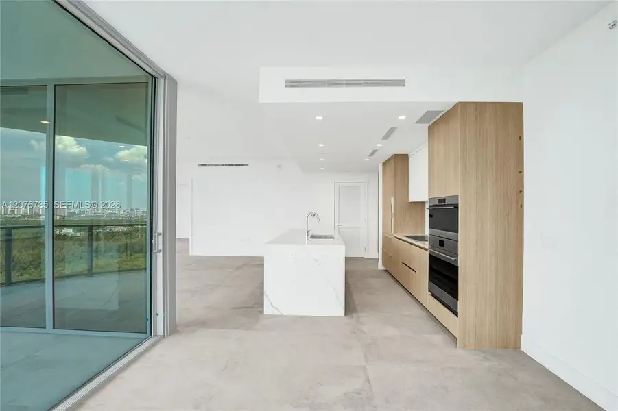 Furnished interior view inside a new home in , North Miami (Image 21).