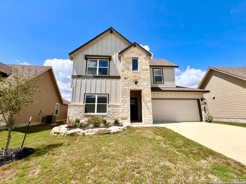 Front exterior of a new home in Brookstone Creek, San Antonio, TX, highlighting curb appeal (Image 28). Front exterior of a new home in Brookstone Creek, San Antonio, TX, highlighting curb appeal (Image 28).