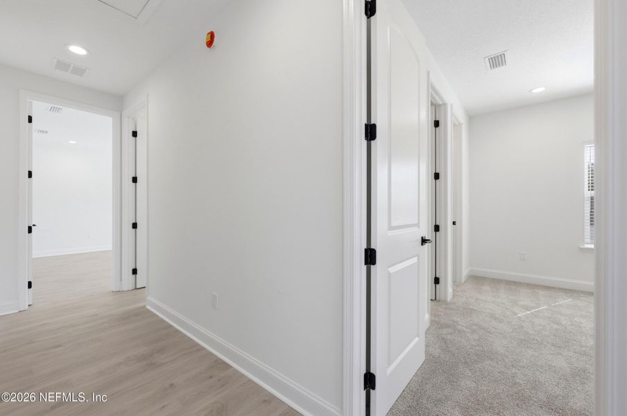 Spacious, unfurnished interior of a new home in Silver Landing At Silverleaf, St. Augustine (Image 33).