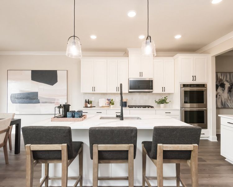 The beautiful granite countertop gives you ample space to prepare dinner or meal prep.
