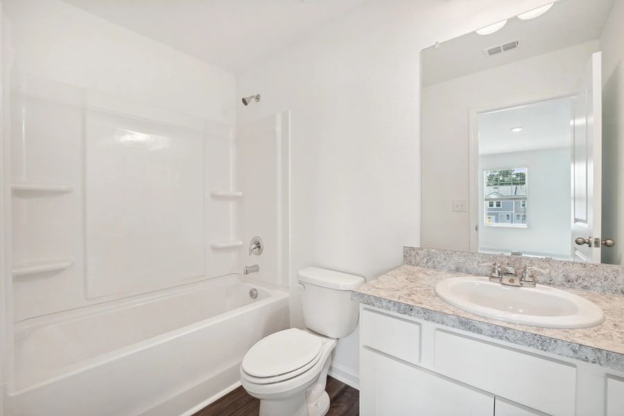 Representative furnished interior of a home built from the Nebula by Starlight Homes in Aster Towns, Summerville (Image 11).