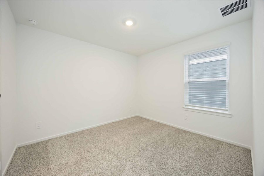 Spacious, unfurnished interior of a new home in Alaia Crossing, Houston (Image 24).