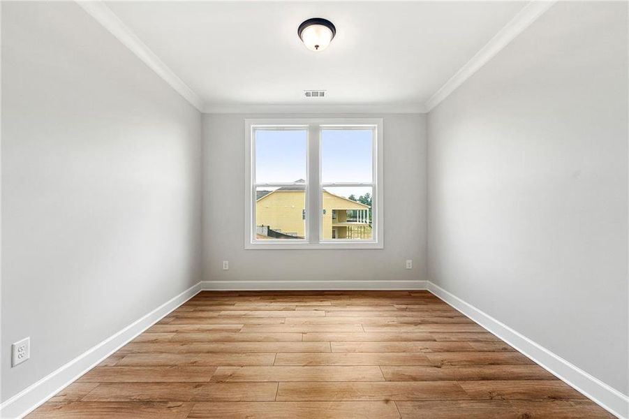 Spacious, unfurnished interior of a new home in Cresswind Georgia at Twin Lakes, Hoschton (Image 17).