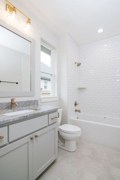 Representative furnished interior of a home built from the The Kaylee by Reece Homes in Pebble Creek, College Station (Image 18).