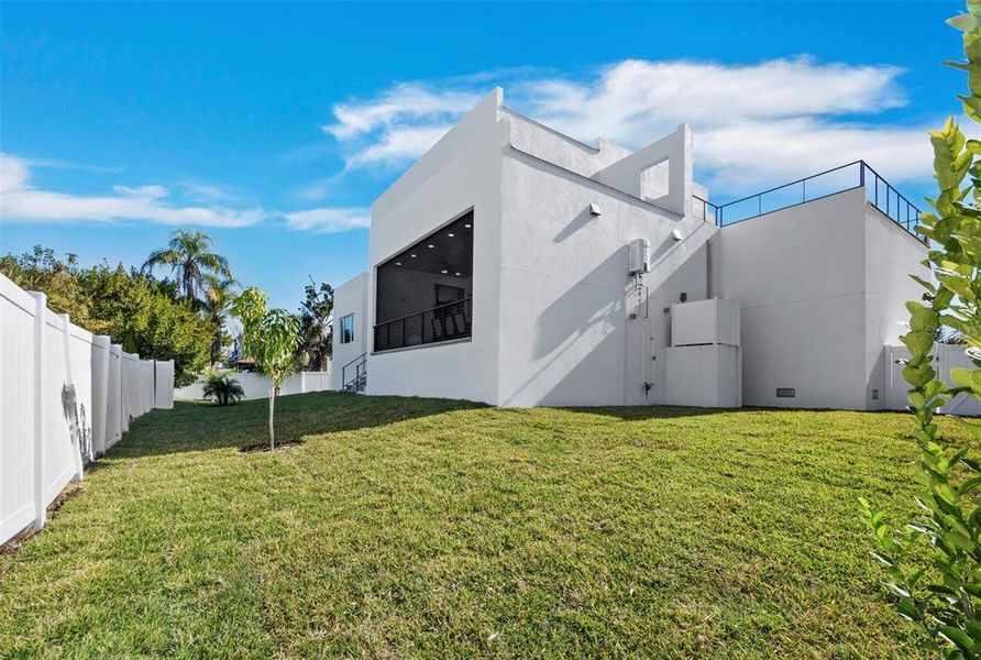 Exterior details and patio area of a home in , Longboat Key (Image 27).