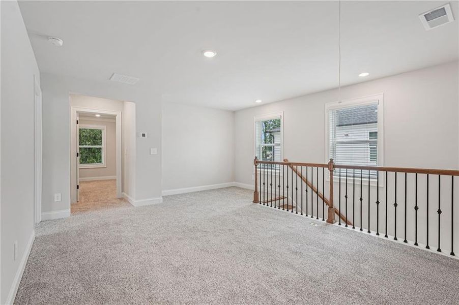 Spacious, unfurnished interior of a new home in Hemingway - Reserve Series, Cumming (Image 38).