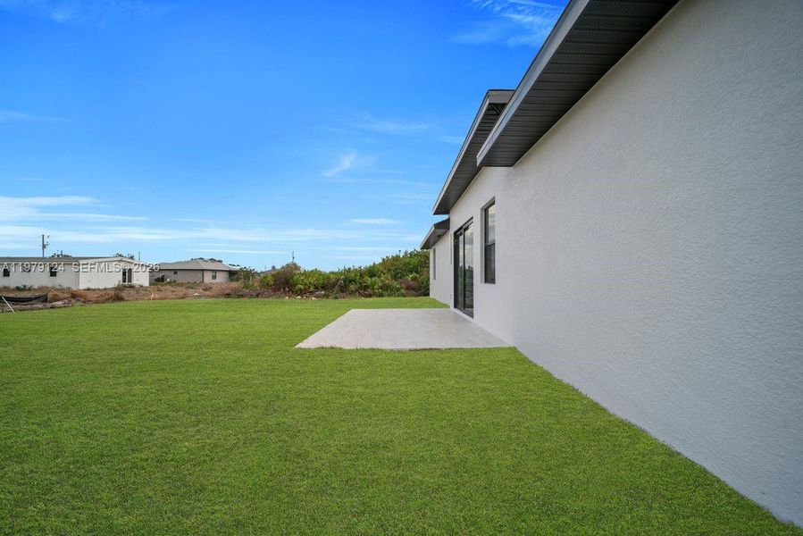 Exterior details and patio area of a home in , Lehigh Acres (Image 3).