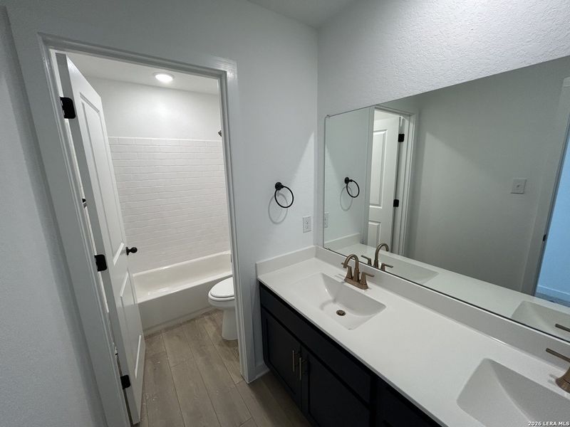 Furnished interior view inside a new home in Hennersby Hollow, San Antonio (Image 12).