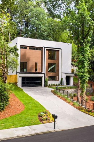 Front exterior of a new home in , Atlanta, GA, highlighting curb appeal (Image 25).