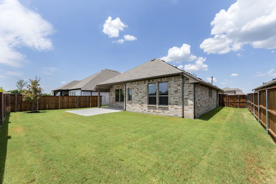 Exterior details and patio area of a home in River Ranch, Van Alstyne (Image 25). Exterior details and patio area of a home in River Ranch, Van Alstyne (Image 25).